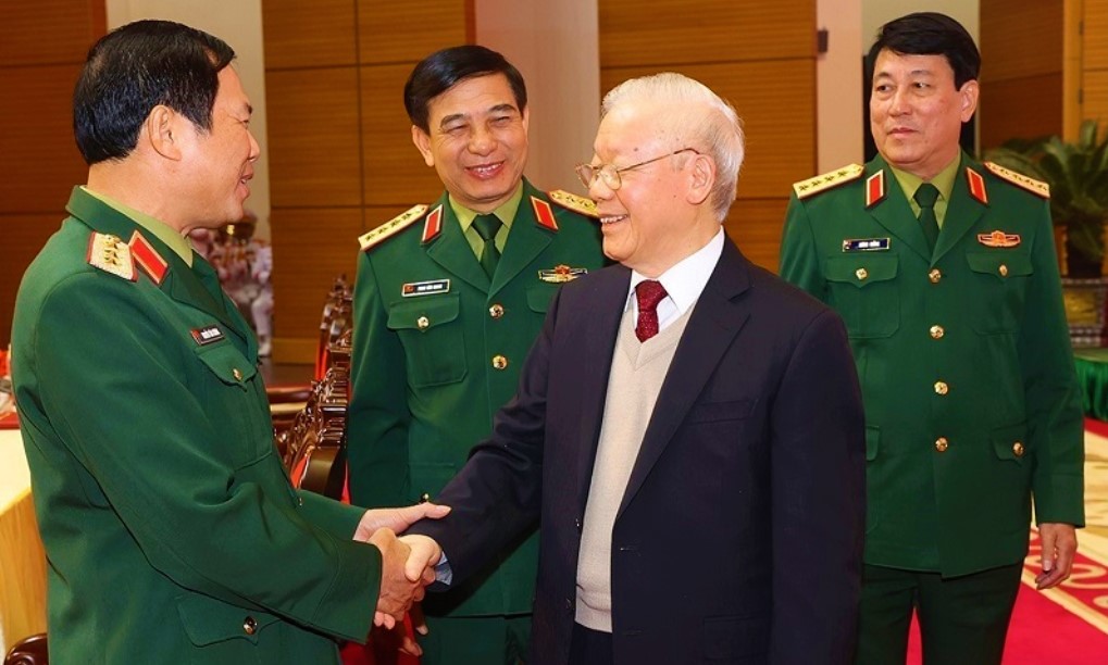 Tổng Bí thư Nguyễn Phú Trọng, Bí thư Quân ủy Trung ương cùng các đồng chí lãnh đạo Quân ủy Trung ương, Bộ Quốc phòng dự Hội nghị Quân chính toàn quân năm 2022 . (Ảnh: TTXVN)